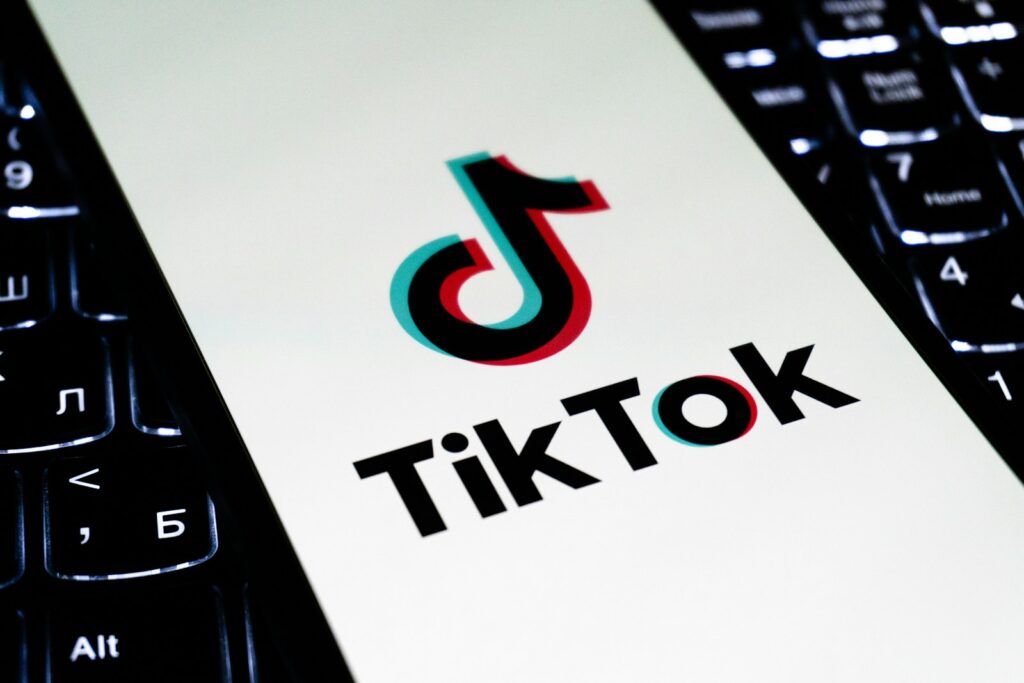 Tiktok logo on a phone screen